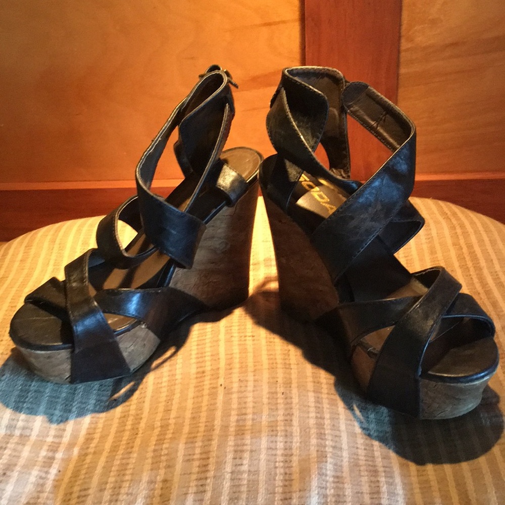 Strappy black leather wedges